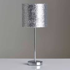 When choosing bedside lamps, where do you begin? Wilko Milan Silver Glitter Table Lamp Wilko