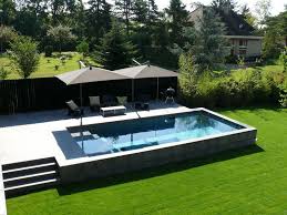 Piscine Hors Sol Realisee En Beton Par Carre Bleu Linas Architecte Lode Architecture Piscine Et Jardin Amenagement Piscine Piscine Hors Sol