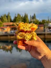 The Breakfast Croissant from Port of San Fransokyo Cervecería $11.49 This  breakfast croissant has bacon, eggs, jalapeños, cheese, green onions, and  sesame seeds. This is my new favorite quick service breakfast item