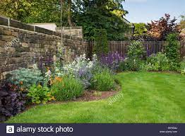 Download This Stock Image Corner Of Beautiful Private Traditional Landscaped Country Garden Yo Country Gardening Summer Flowers To Plant Planting Flowers
