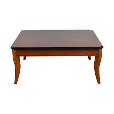The black, powder coated legs create a design on the top surface of the table, adding extra flair to this already stylish set. 90 Off Cherry Wood Square Coffee Table Tables