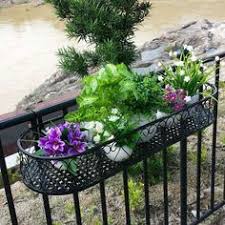Seasonal flowers can be planted, but also vegetables, turning your balcony into an urban grad. 33 Balcony Rail Planter Ideas Railing Planters Balcony Railing Balcony Planters