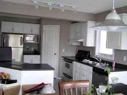 Gray Walls White Cabinets Black Countertop Google Search Grey Kitchen Colors Antique White Kitchen Grey Kitchen Walls