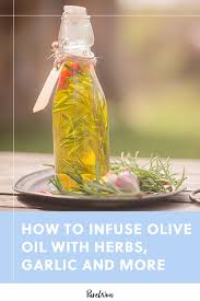 How To Infuse Olive Oil With Herbs Garlic And Whatever Else Your Heart Desires Purewow Recipe How To Cooki In 2020 Infused Olive Oil Olive Oil Dispenser Olive Oil