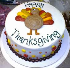 Add a few festive decorations and it makes a perfect centerpiece. White Thanksgiving Turkey Cake With Colorful Decor Jpg Turkey Cake Thanksgiving Cakes Thanksgiving Cakes Decorating