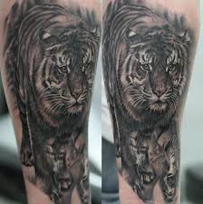Shop temporary tattoos & body art 12+ best tiger and cub tattoo designs. 55 Awesome Tiger Tattoo Designs Cuded Tiger Tattoo Design Tiger Tattoo Tiger Head Tattoo