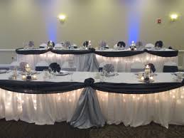 Navy And Silver Swag With Lighting Underneath Head Table Set Up Caprottiscatering Capriottispalazzo Wedding Headtable Wedding Linens Wedding Table Set Up