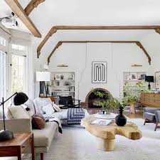 The mid century living room is punctuated with deep blue accents that coordinate with the deep blue and walnut kitchen cabinets in the open living space. 15 Midcentury Modern Decor And Design Ideas