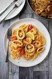 Quick Seafood And Garlic Linguine Scruff Steph Recipe White Wine Pasta Recipes Seafood Pasta Dishes Squid Recipes
