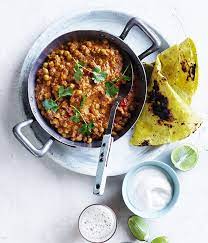 Chana Masala With Yoghurt And Flatbread Recipe Recipe Curry Recipes Vegetarian Vegetarian Dishes Recipes