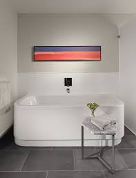 Little Luxury 30 Bathrooms That Delight With A Side Table For The Bathtub Small White Bathrooms Classic Bathroom Furniture White Small Table