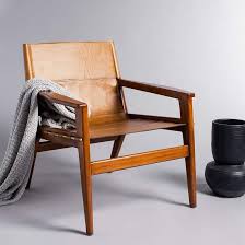 Culkin Brown And Light Brown Leather Sling Chair 85m89 Lamps Plus Leather Sling Chair Leather Accent Chair Faux Leather Chair