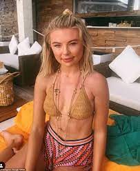 Georgia Toffolo flaunts her washboard abs in chic navy blue bikini | Daily  Mail Online