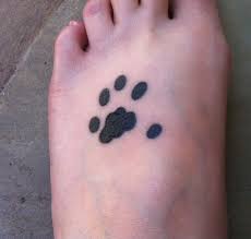 One Of Our Cats Is Polydactyl She Has Thumbs So I Took Her Paw Print And Got It Tattooed On My Foot Cat Paw Print Tattoo Paw Print Tattoo Paw Tattoo
