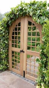 Wooden Garden Gates Covered In Climbers In 2020 Garden Gate Design Wooden Garden Gate Fence Design