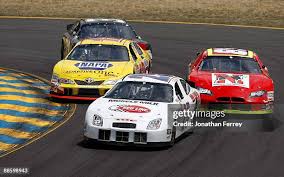 Tom Hubert, driver of the Red Line Oil/Hall Fabrication/Muscle Milk... News  Photo