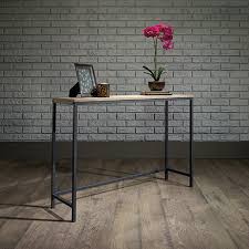 The simplicity of the wood and metal design means that it complements most décor styles. North Avenue Sofa Table 420042 Sauder Sauder Woodworking