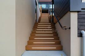 Wood handrails, easement, & fittings in several different species of wood. Lighted Stair Case In A Hotel Stock Image Image Of Guiding Lighted 171389147