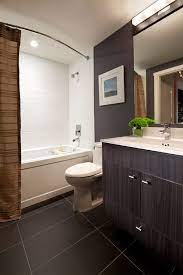 The hamper is a handwoven basket from africa. Bathroom Ideas For Small Condo Condo Bathroom Bathroom Remodel Idea Small Condo Bathroom Ideas
