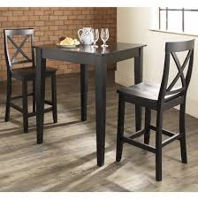 Also referred to as pub tables or breakfast tables, they pair well with bar stools and can even provide standing alternatives during parties or events. Brooklyn 3 Piece Black Pub Table With X Back Stools Kd320005bk Crosley Radio Pub Dining Set Pub Table Sets Dining Furniture