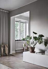 It's cozy because… deep wingback chairs with pillows and throws are comfy and cozy fireside seats. Cold And Warm Looks Combined Coco Lapine Design Interior Design Interior Living Room Designs