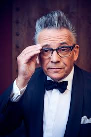 I gave my coat to a freezing mother and her baby… Seven days later, two men  in suits banged