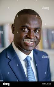 Omar Bah, executive director of The Refugee Dream Center, is photographed  in Providence, R.I., Wednesday, Feb. 9, 2022. Bah, a Democrat, is running  for the state's seat in Congress being vacated by