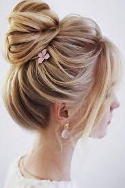 15 Hairstyles With Bun And Bangs Lovehairstyles Com Medium Length Hair Styles Wedding Hairstyles For Medium Hair Hair Lengths
