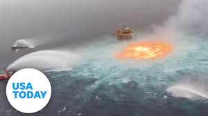 A video posted on social media showed three ships trying to suffocate a fire emerging from the sea, very close to an offshore platform. 3cmxdmswy03l2m