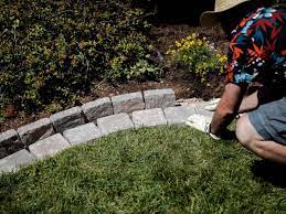 Any irregularities on the concrete. Diy Paver Edging You Can Mow Hgtv