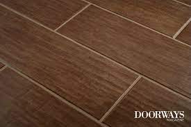 Laminate comes in different textures to give off the appearance of real hardwood flooring. Pros And Cons Of Tile That Looks Like Wood Doorways Magazine
