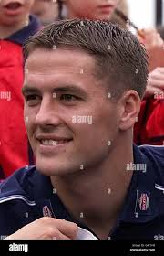 Liverpool and England striker Michael Owen at Fairfield High school in  Widnes, Cheshire, launching a new Football Association initiative aimed at  raising standards of football coaching in schools Stock Photo