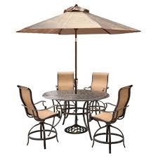 With a fire pit, you can enjoy many a memorable summer night in your backyard with family and friends. Hanover Man5pcfprd Br Manor 5 Piece High Dining Set In Tan With 4 Swivel Chairs And A 40 000 Btu Cast Top Fire Pit Table Outdoor Furniture Dining Sets