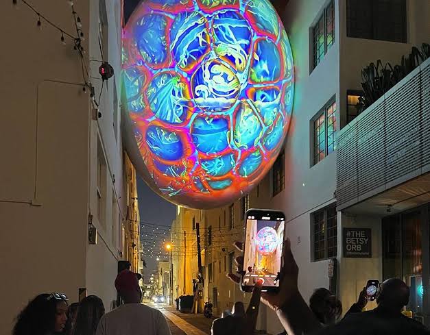 South Beach's giant floating egg is being illuminated with digital art all  year-round