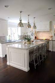 While smaller kitchen islands may be only able to accommodate two seats. 30 Kitchen Islands With Seating And Dining Areas Digsdigs