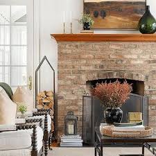 If you have a fireplace against a boring brick wall, adding a mantel can add a lot of style and texture to the room. Red Brick Fireplace Design Ideas
