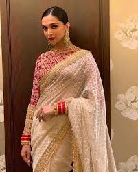 The Real Anushka Sharma Deepika Padukone Lehenga Cost Frugal2fab Saree Look Stylish Sarees Saree Trends