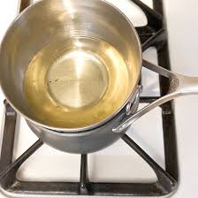 Add two to three inches of water to the bottom pot or pan depending on if you are using a spacer between the bottom pan and the top pan. How To Make A Homemade Double Boiler Popsugar Smart Living