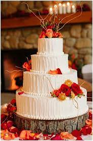 White Wedding Cake With Orange Flowers Fall Wedding Cakes Wedding Cake Decorations Country Wedding Cakes