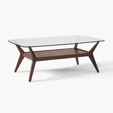 The stilt collection is a study in high design marked by the innovative melding of glass and wood. Jensen Coffee Table Glass In 2021 Coffee Table Rectangle Coffee Table Glass Table