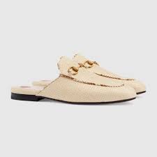 Shop The Women S Princetown Raffia Slipper By Gucci Embodying A Summer Vibe The Princetown Slipper Is Crafte Gucci Designer Slippers Gucci Princetown Slipper