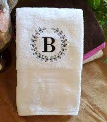Embroidery patterns by harriet tew. Embroidered Bath Towel Beautiful Vintage Wreath Embroidery Etsy Embroidered Bath Towels Towel Embroidery Designs Towel Embroidery