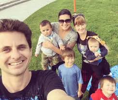 Polyamorous family are expecting their FIFTH baby.... and they hope to  adopt each other's kids