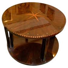 Bring a little art deco style into your space with the southern enterprises avenida cocktail table. Ruhlmann Round Style Coffee Table Small Tables Art Deco Collection