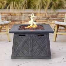Combining a fire pit with a coffee or dining table marries the best of both worlds into a focal piece that invites friends and family to relax and settle in for a night of great food and conversation. Cedar Ridge 32 Wide Modern Gas Outdoor Fire Pit Table 79t91 Lamps Plus