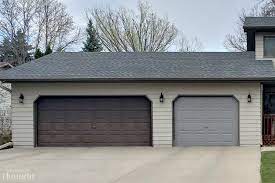 A garage door makes up about a third of your house's facade. Painting Garage Doors A Wonderful Thought