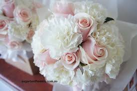 Depending on the flowers you can turn the bouquet the black rose refers to mourning.the pink carnations are the symbol of a mother's undying love.if presented around easter, this bouquet might. Rose And Carnation Wedding Bouquet Bridesmaids Bouquet With Pale Peach Pink Rose And White C Carnation Wedding Bouquet Carnation Wedding Pink Wedding Flowers