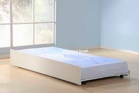 This trundle can be made to any size and used for storage or a trundle bed. Trundle Beds White Wooden Under Bed Trundle And Mattress