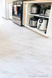 Some of the most reviewed products in flooring are the trafficmaster carrara marble 12 in. How To Install Peel And Stick Vinyl Tiles Houseful Of Handmade