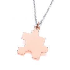 Maybe you would like to learn more about one of these? Sterling Silver Rose Gold Puzzle Piece Necklace By David Deyong